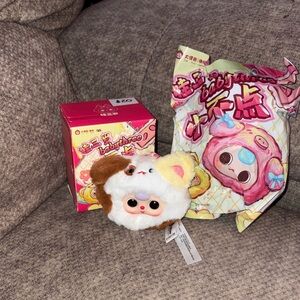 This is a Baby Three Tiny Animal Head Series plush. Authentic